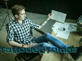 A0TattooedTomas
